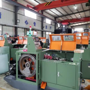 Three stations bolt forging machine